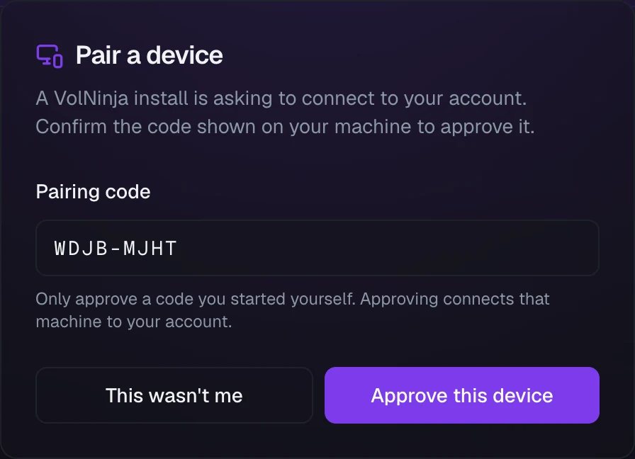 The Pair a device card, with the pairing code filled in and the Approve this device and This wasn't me buttons